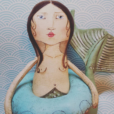 mermaid with swim ring