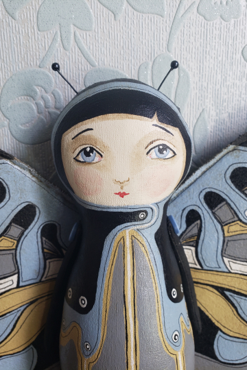 Folk art blue butterfly fairy.