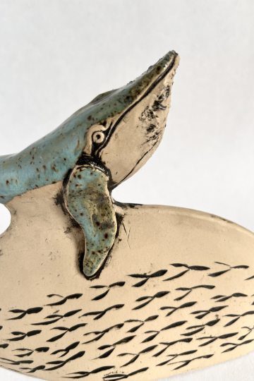 'Into the waves' ceramic whale sculpture.