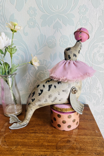 Circus Seal with bell.