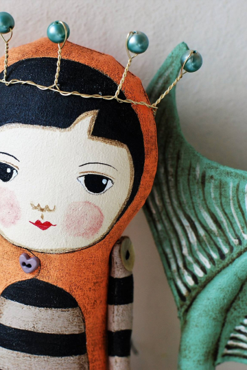 mermaid in orange jacket