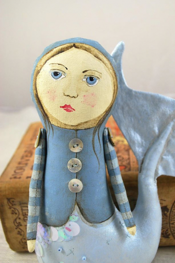 mermaid with stripe arms