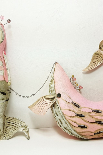 Mermaid and whale friend.